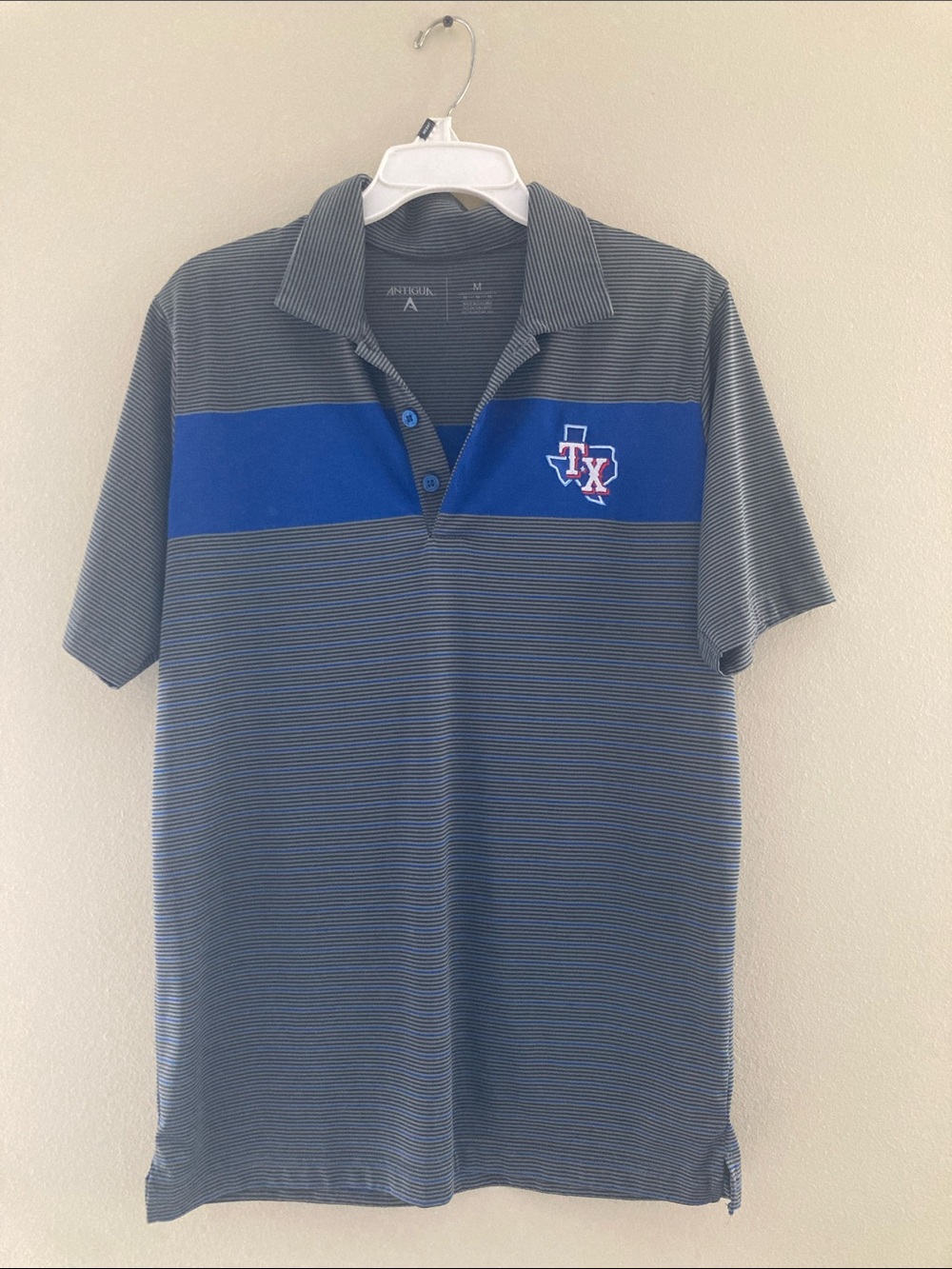 Texas Rangers Antigua Men’s Gray Polo with Royal Blue Chest Stripe and TX Logo